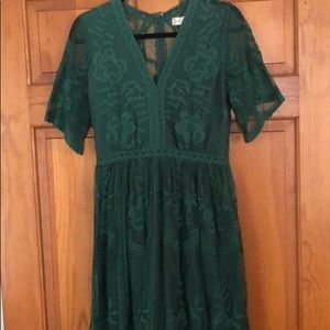 Emerald lace dress with sheer detail